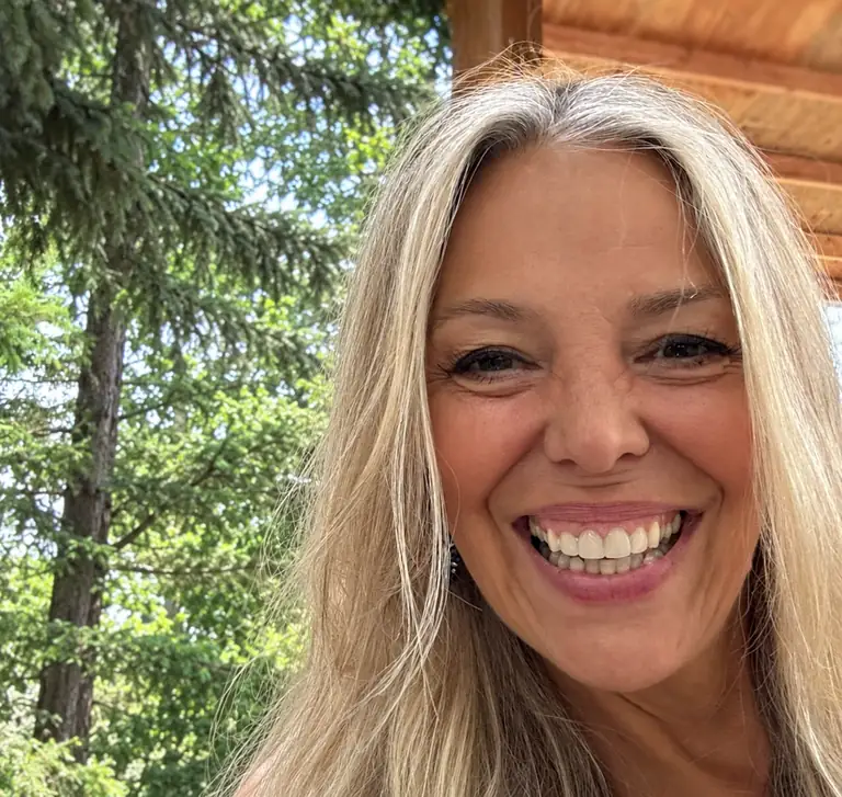 Mikki smiling outdoors